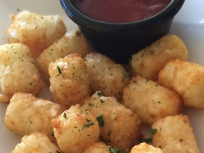 Tater Tots! We bake them just like mom made them, who would fry these? We have a lot of sides to throw in you your order, Tots, Steak Fries (they stay warm longer), Chicken Nuggets, Onion Rings, Mozzarella Cheese Sticks and Zucchini Sticks. Check out our Cheesy Bread too.